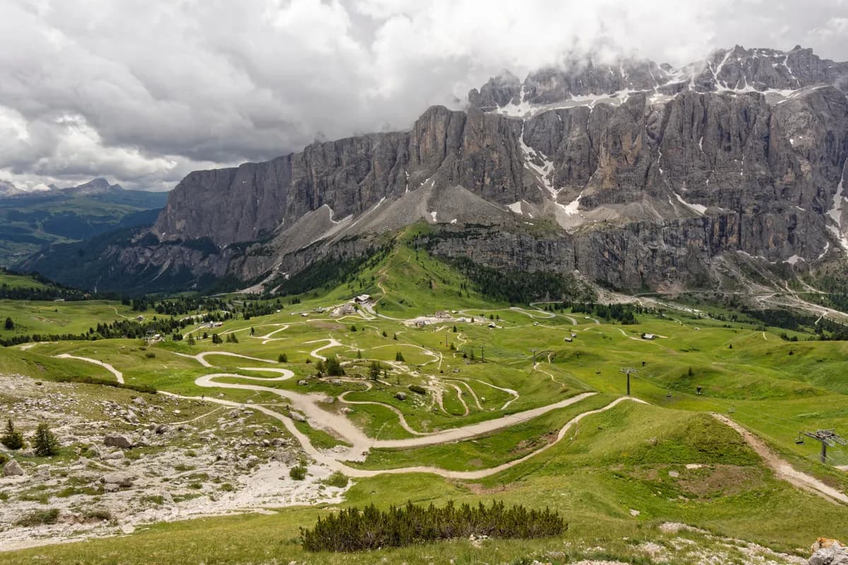 Switchback trails below the Sella massif at golden hour